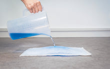 Load image into Gallery viewer, HUGE ABSORBENCY PLUMBER&#39;S PAD Absorbs 1/2 gallon Instantly!